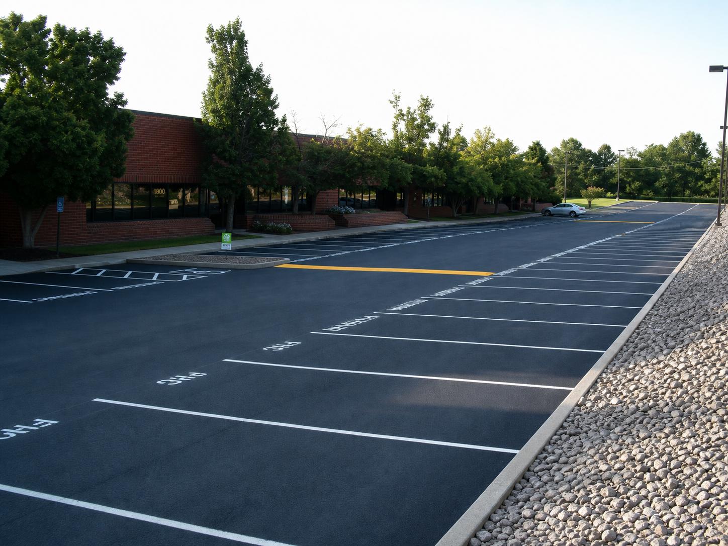 Clean parking lot maintenance and striping project